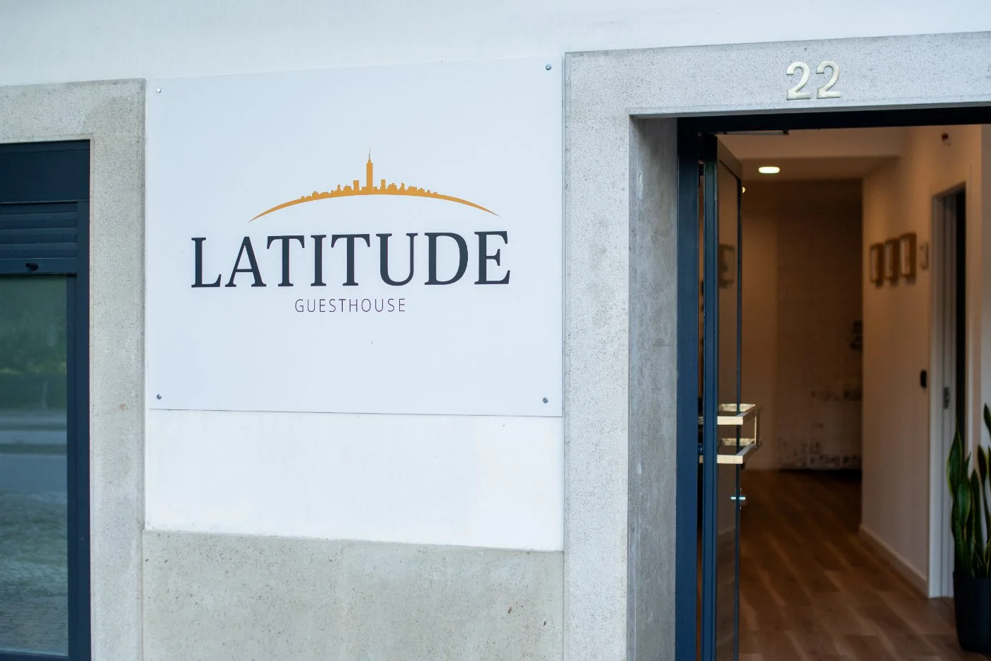 The entrance to Latitude Guesthouse, with the door number 22
